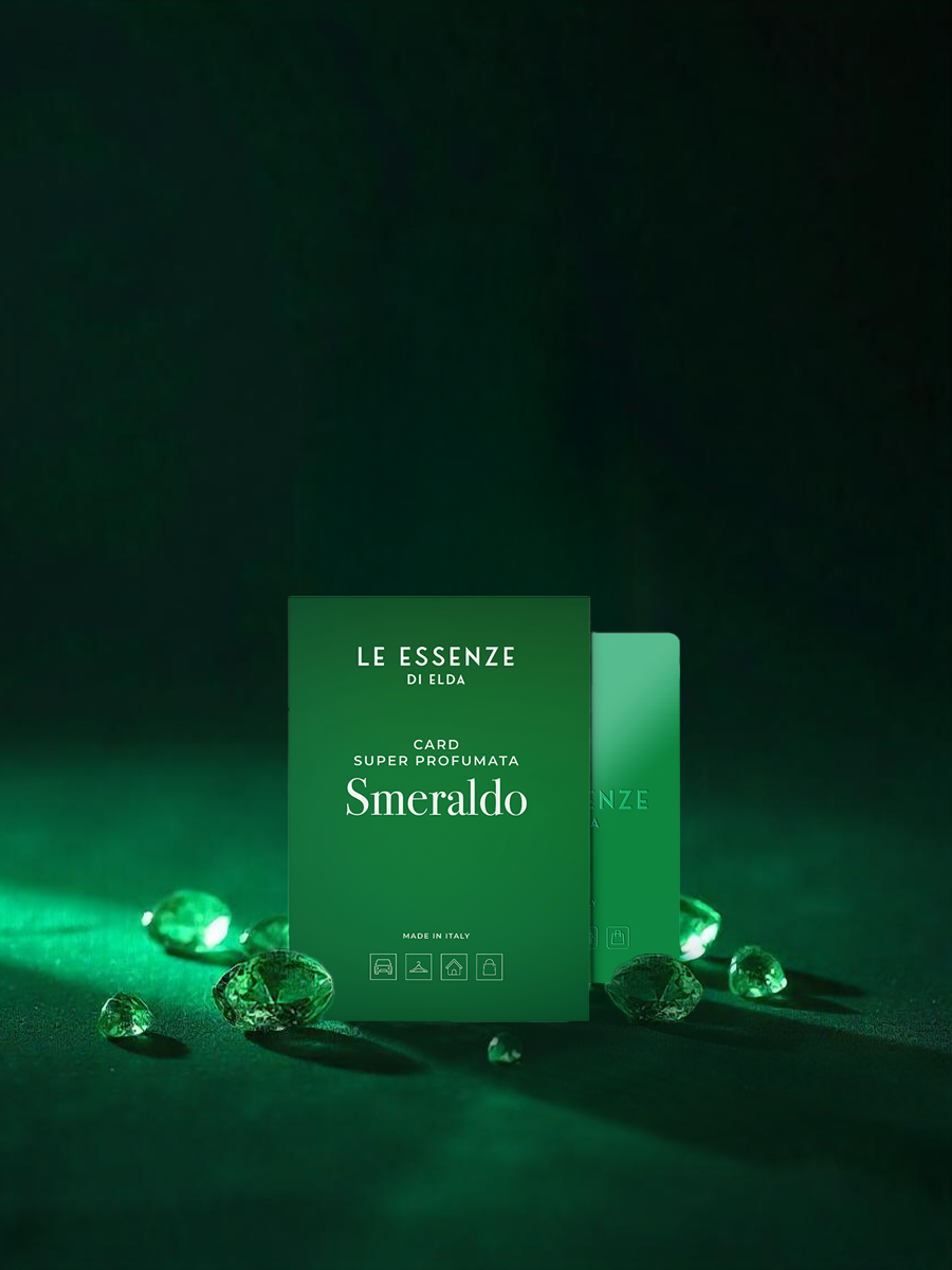 Green box labeled 'Le Essenze di Elda' with emerald stones on a dark background