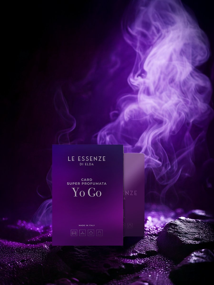 Purple card with 'Le Essenze di Elda' branding and smoke effect on a dark background