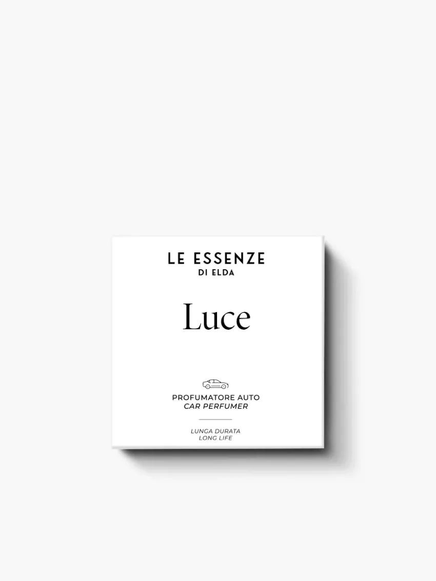 White car perfume box with 'Luce' branding on a white background