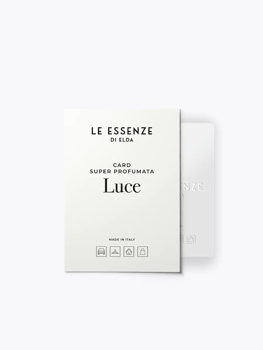 Perfume card packaging with 'Le Essenze di Elda' branding on a white background