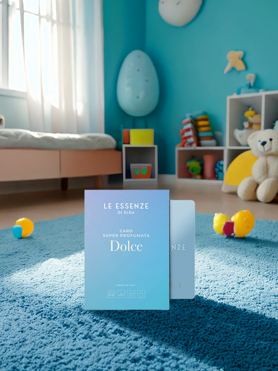 Two boxes of 'Le Essenze Dolce' perfume on a blue carpet in a child's room with toys and furniture.