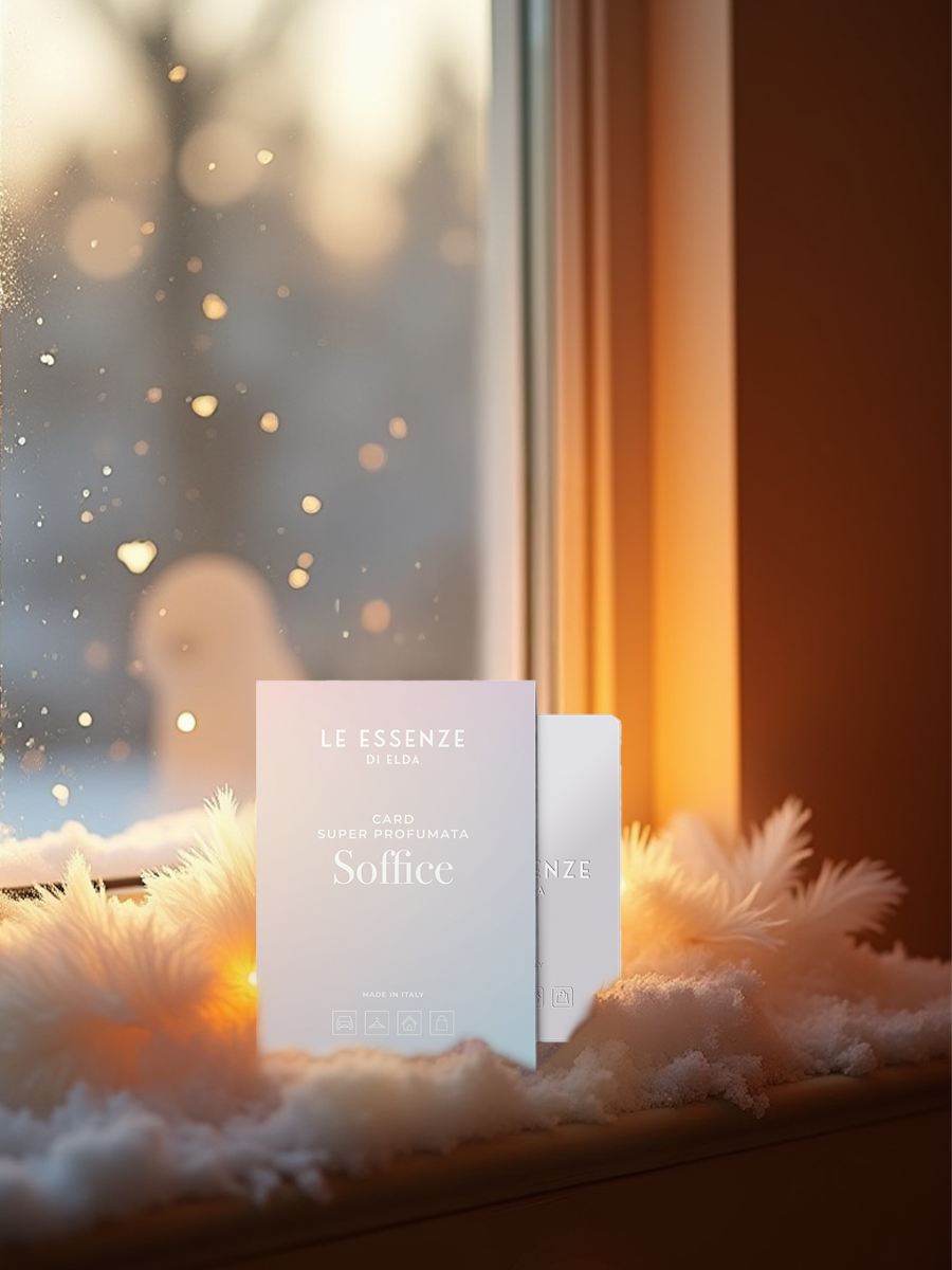 box of 'Le Essenze di Elda' Soffice product on a windowsill with a snowy background