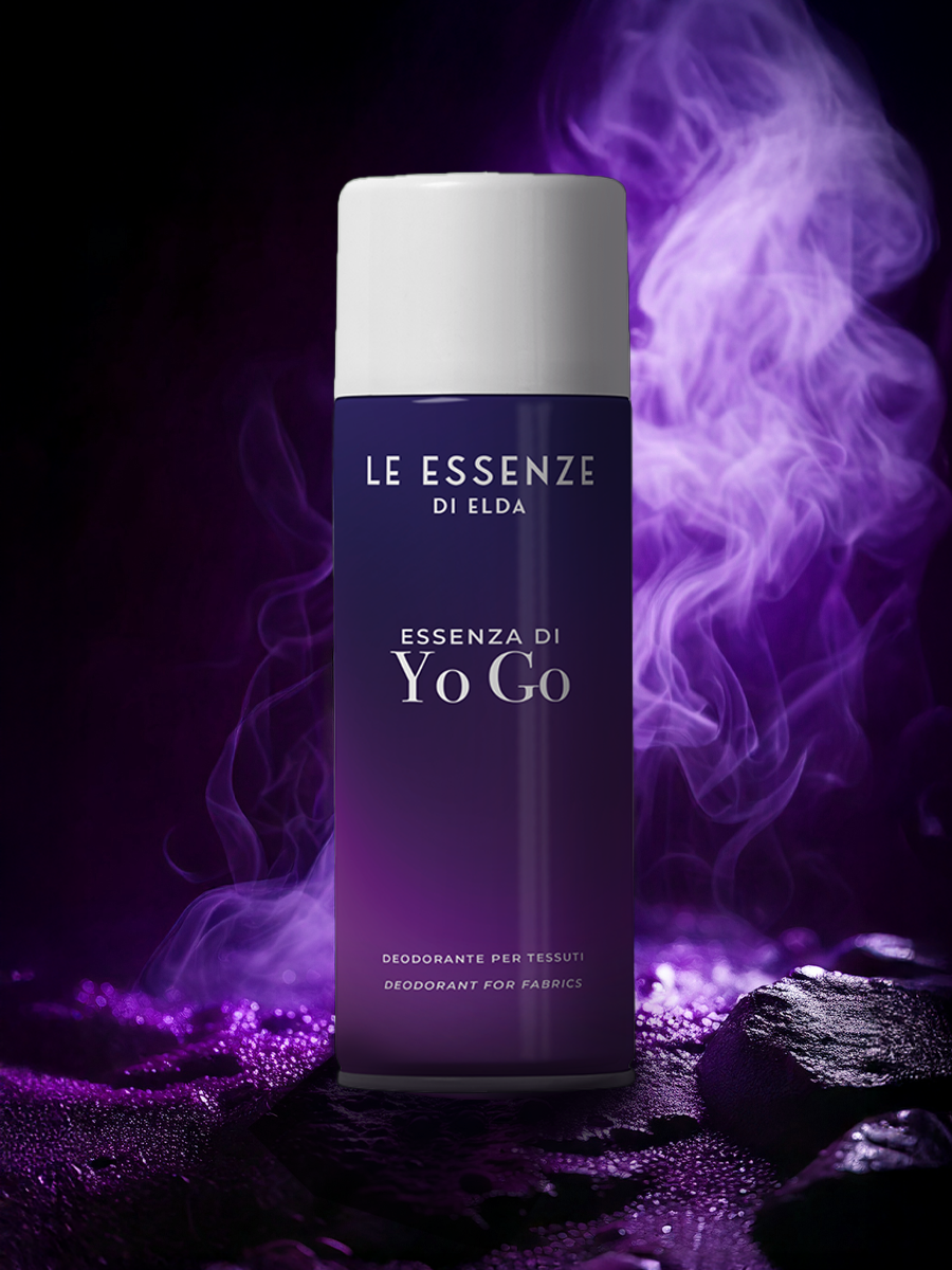 Deodorant bottle labeled 'Le Essenze di Elda' with purple smoke effect on a dark background