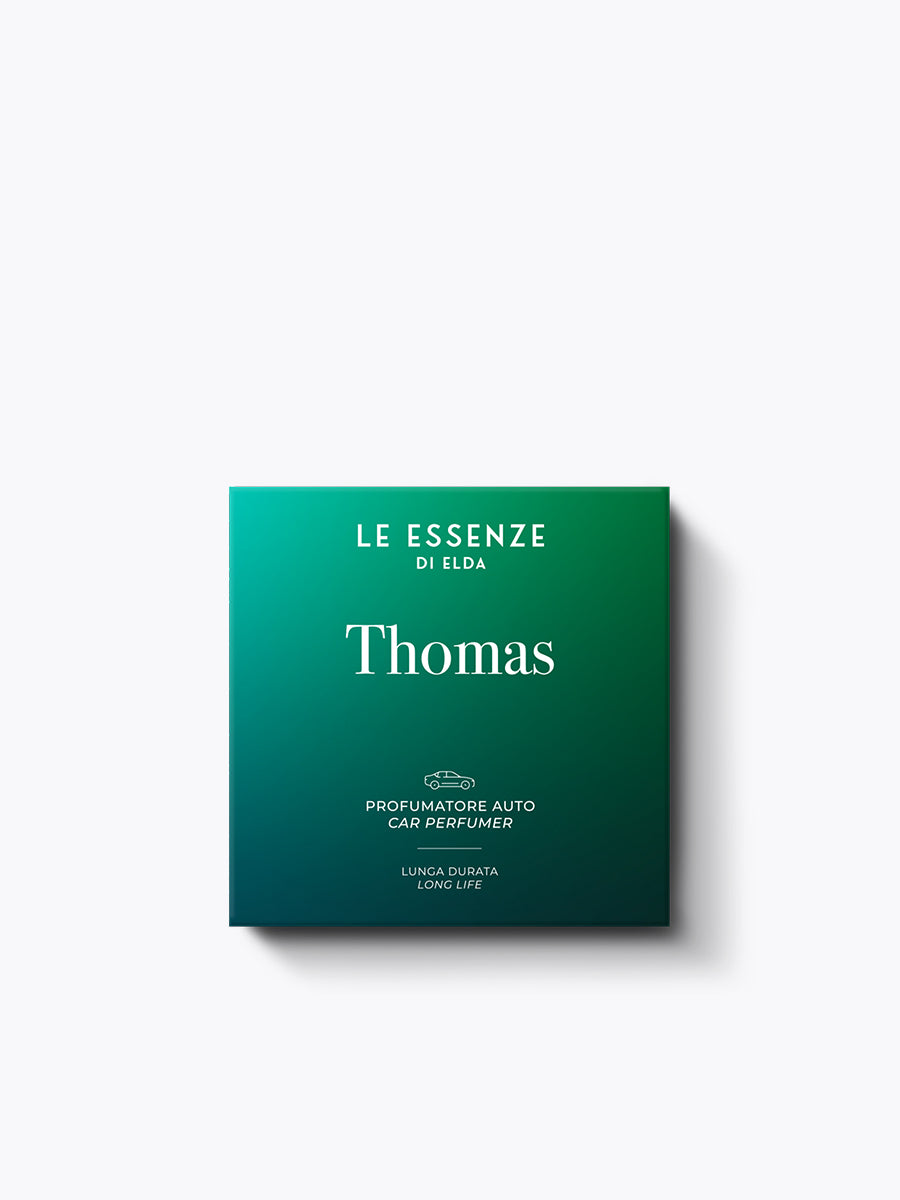 Green packaging of 'Le Essenze di Elda' with 'Thomas' on a white background