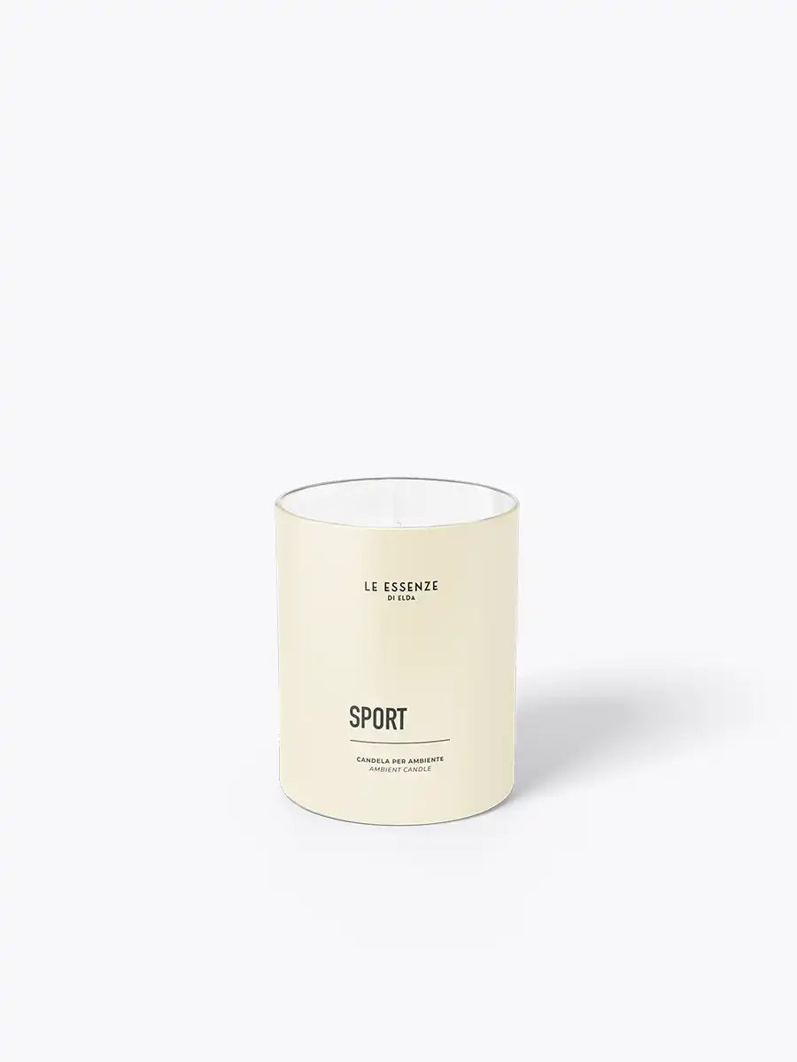 White candle with 'Le Essenze by Elda' branding on a white background